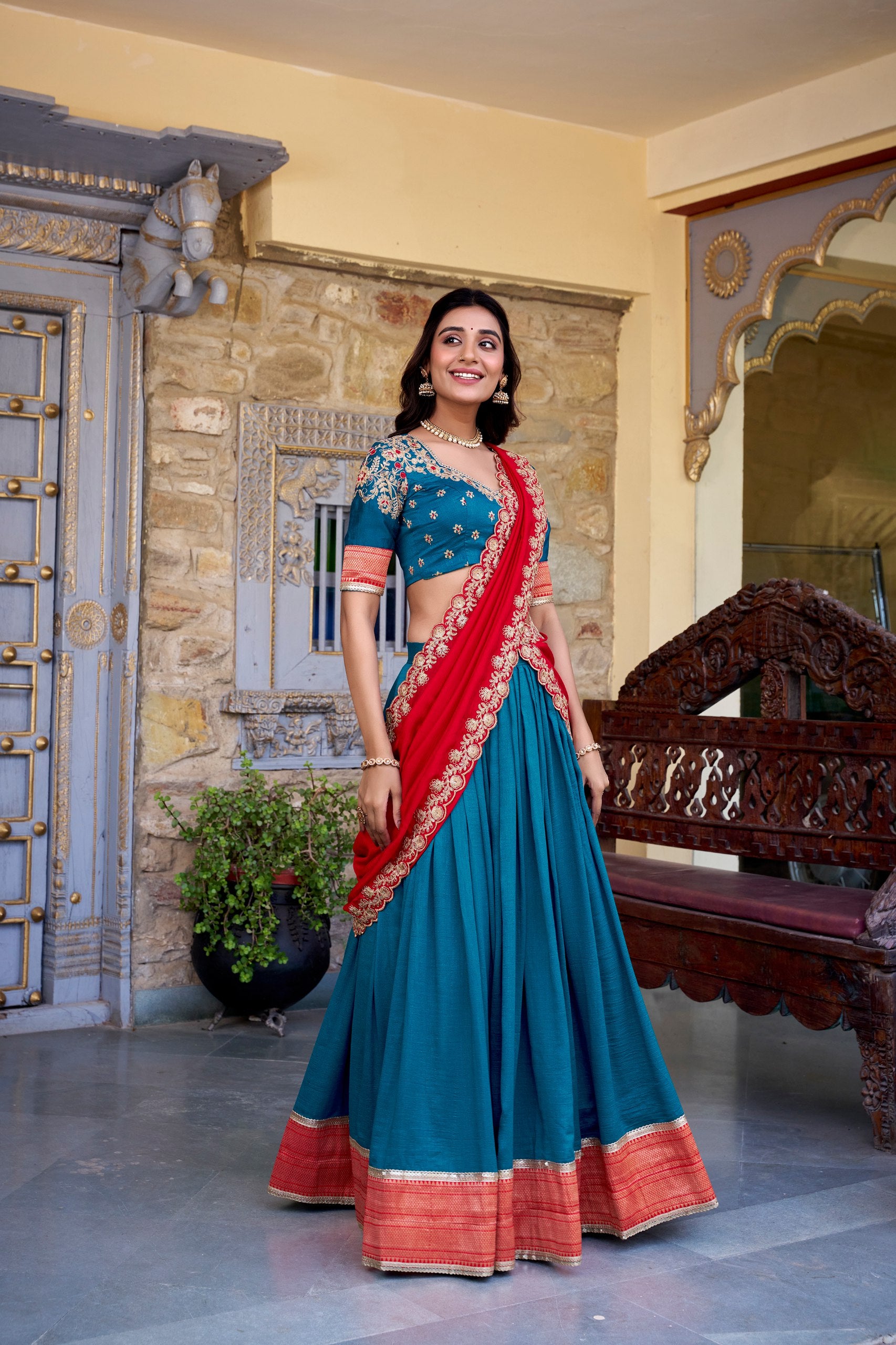 Traditional Wear Teal Color Vichitra Silk With Zari Weaving Work Lehenga Choli