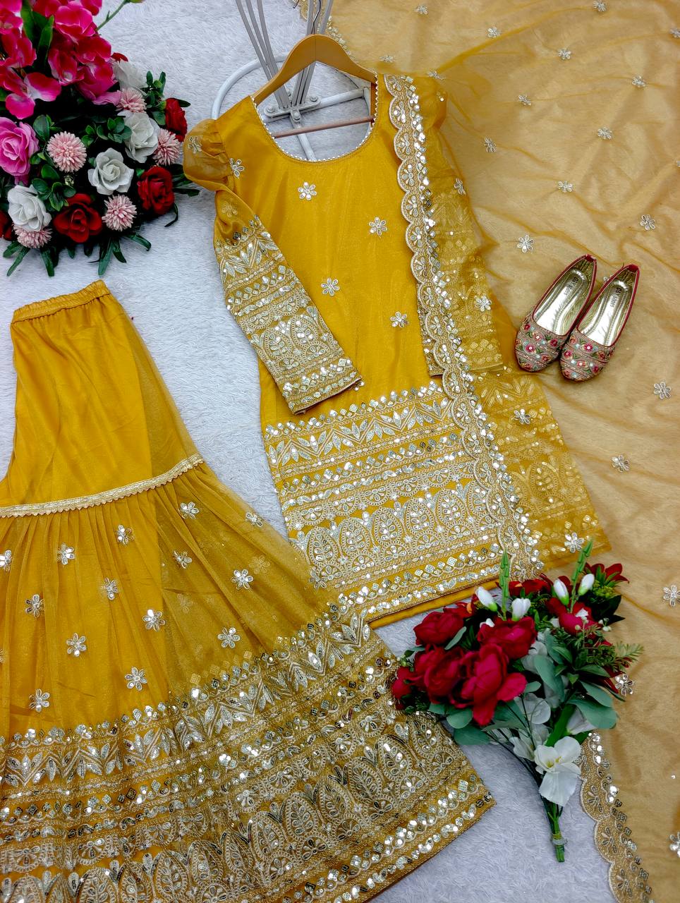 Ceremony Wear Haldi Special Yellow Color Pure Soft Twine Net With Heavy Embroidery Work Sharara Suit