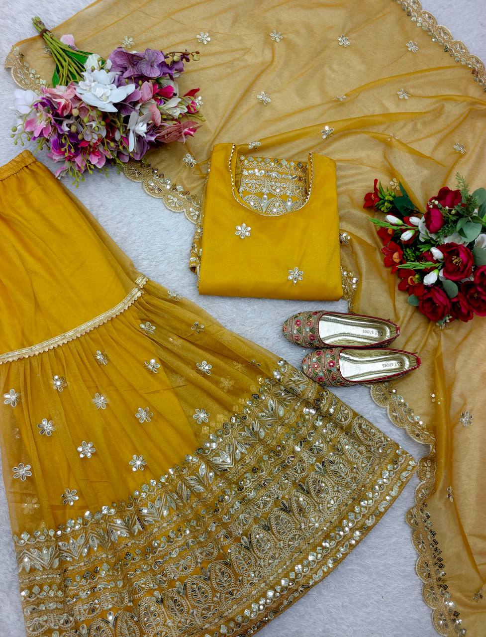 Ceremony Wear Haldi Special Yellow Color Pure Soft Twine Net With Heavy Embroidery Work Sharara Suit