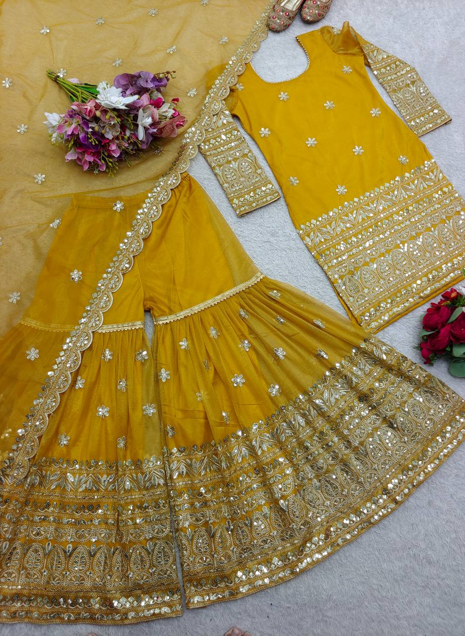 Ceremony Wear Haldi Special Yellow Color Pure Soft Twine Net With Heavy Embroidery Work Sharara Suit