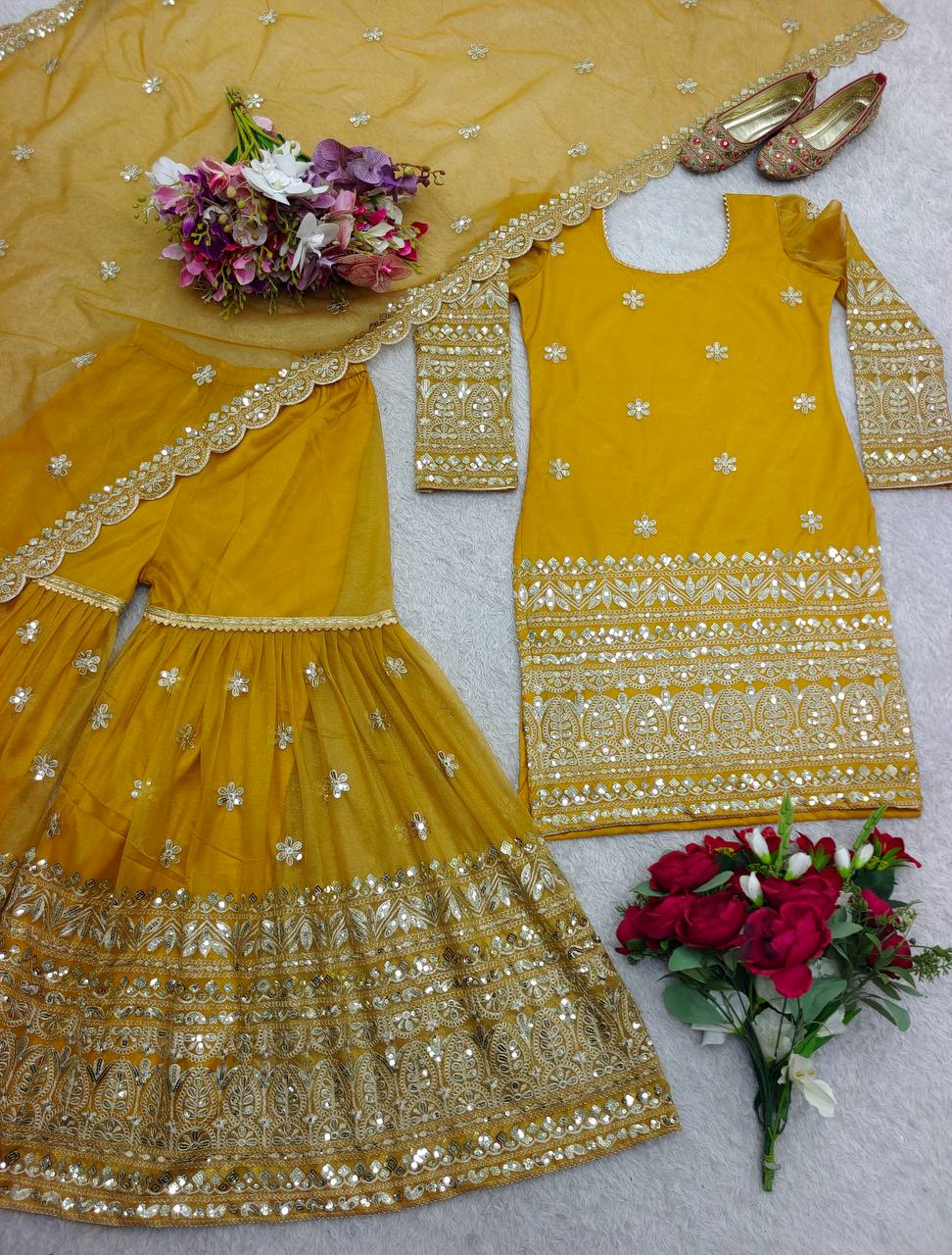 Ceremony Wear Haldi Special Yellow Color Pure Soft Twine Net With Heavy Embroidery Work Sharara Suit