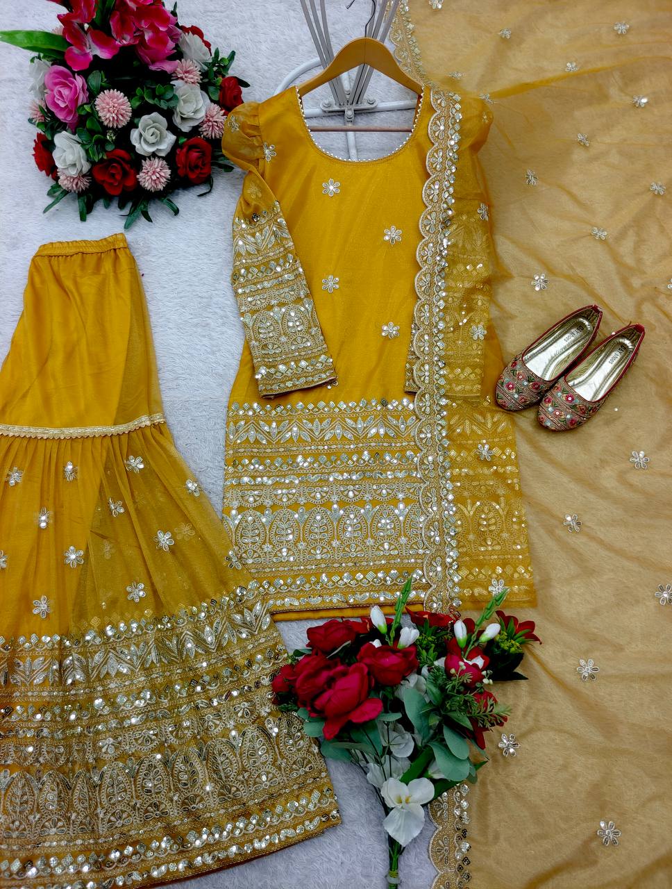 Ceremony Wear Haldi Special Yellow Color Pure Soft Twine Net With Heavy Embroidery Work Sharara Suit