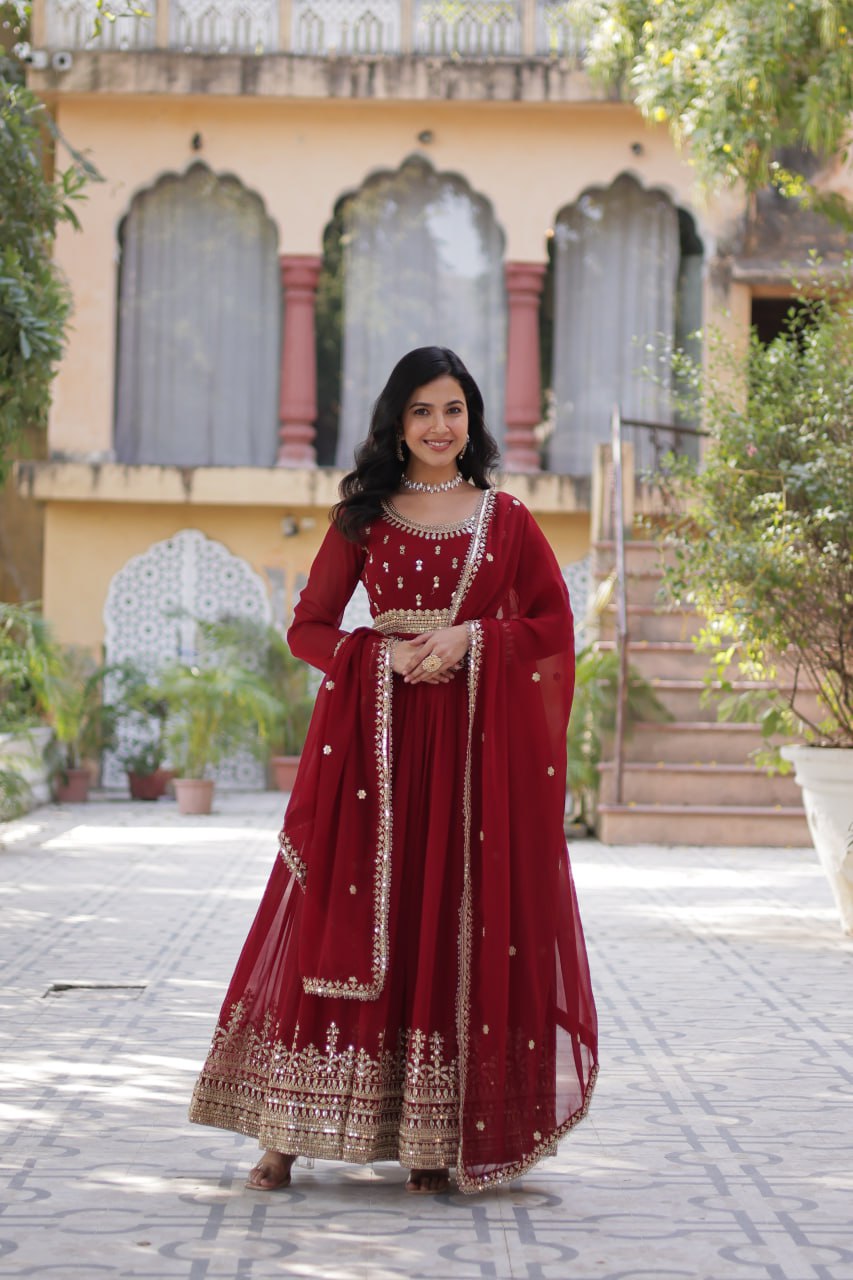 Demanding Maroon Color Faux Blooming With Embroidery Zari Sequins Work Designer Gown