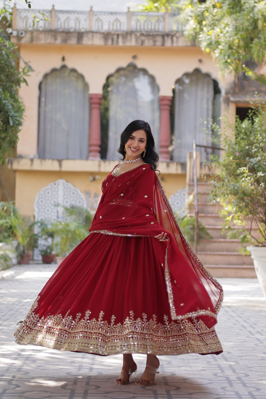Demanding Maroon Color Faux Blooming With Embroidery Zari Sequins Work Designer Gown