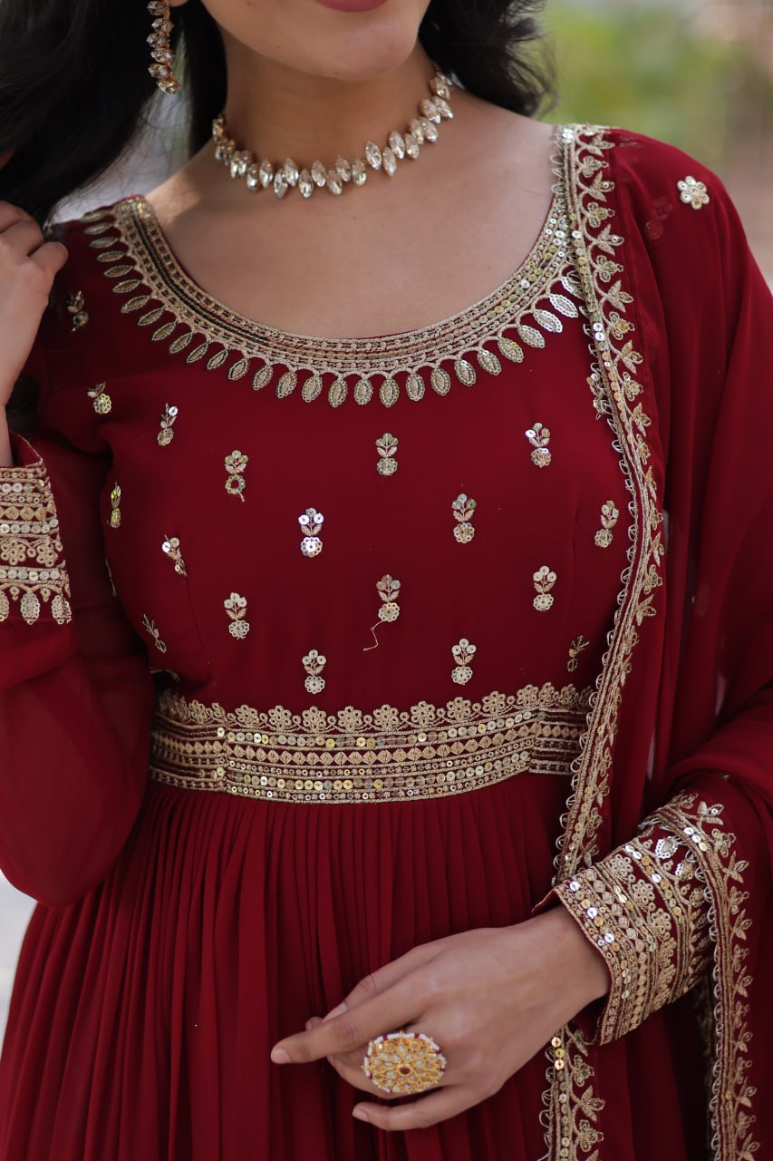 Demanding Maroon Color Faux Blooming With Embroidery Zari Sequins Work Designer Gown