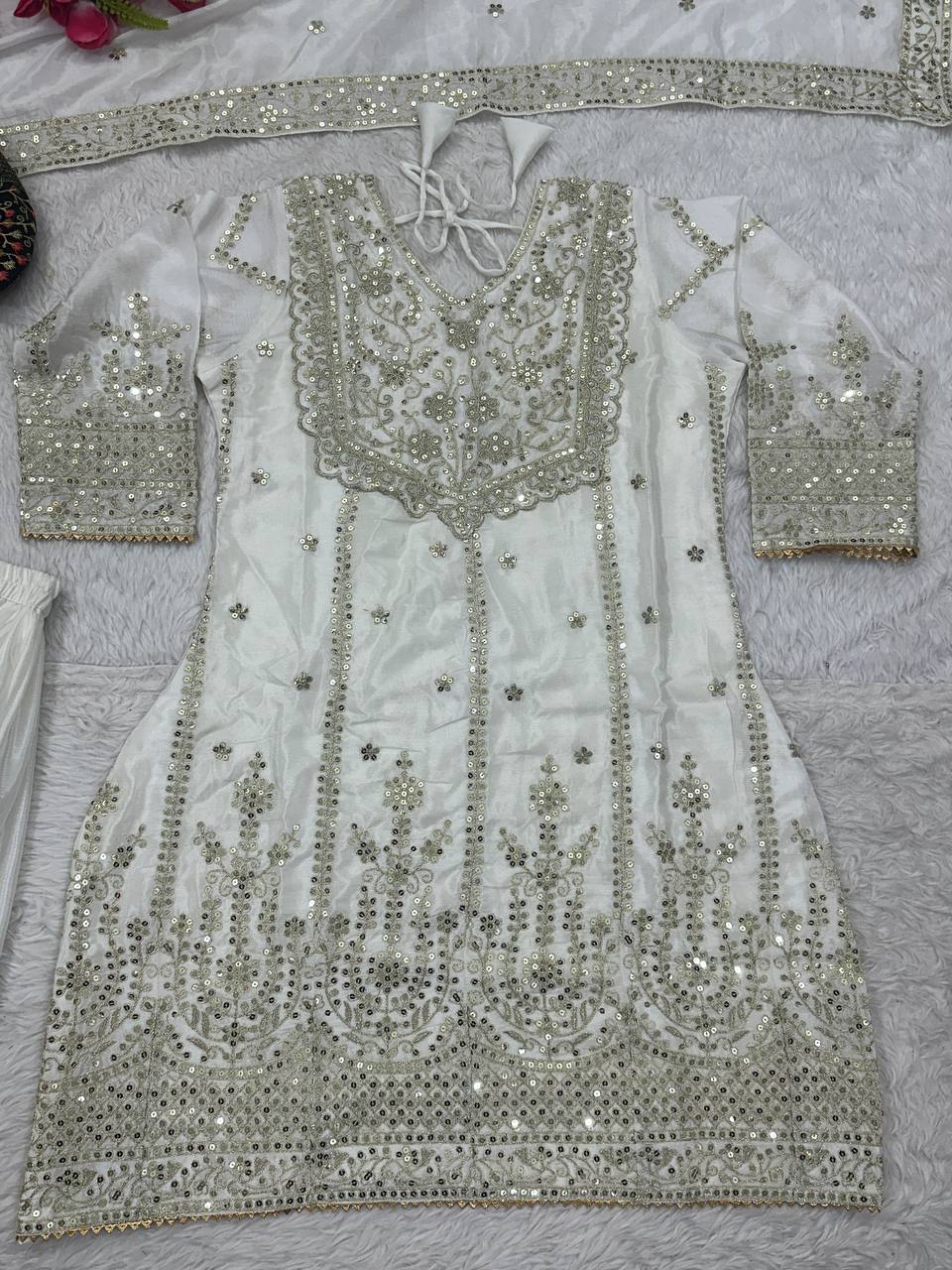 Luxuriant White Heavy Chinon Silk With Embroidery Sequence Coding Work Sharara Suit