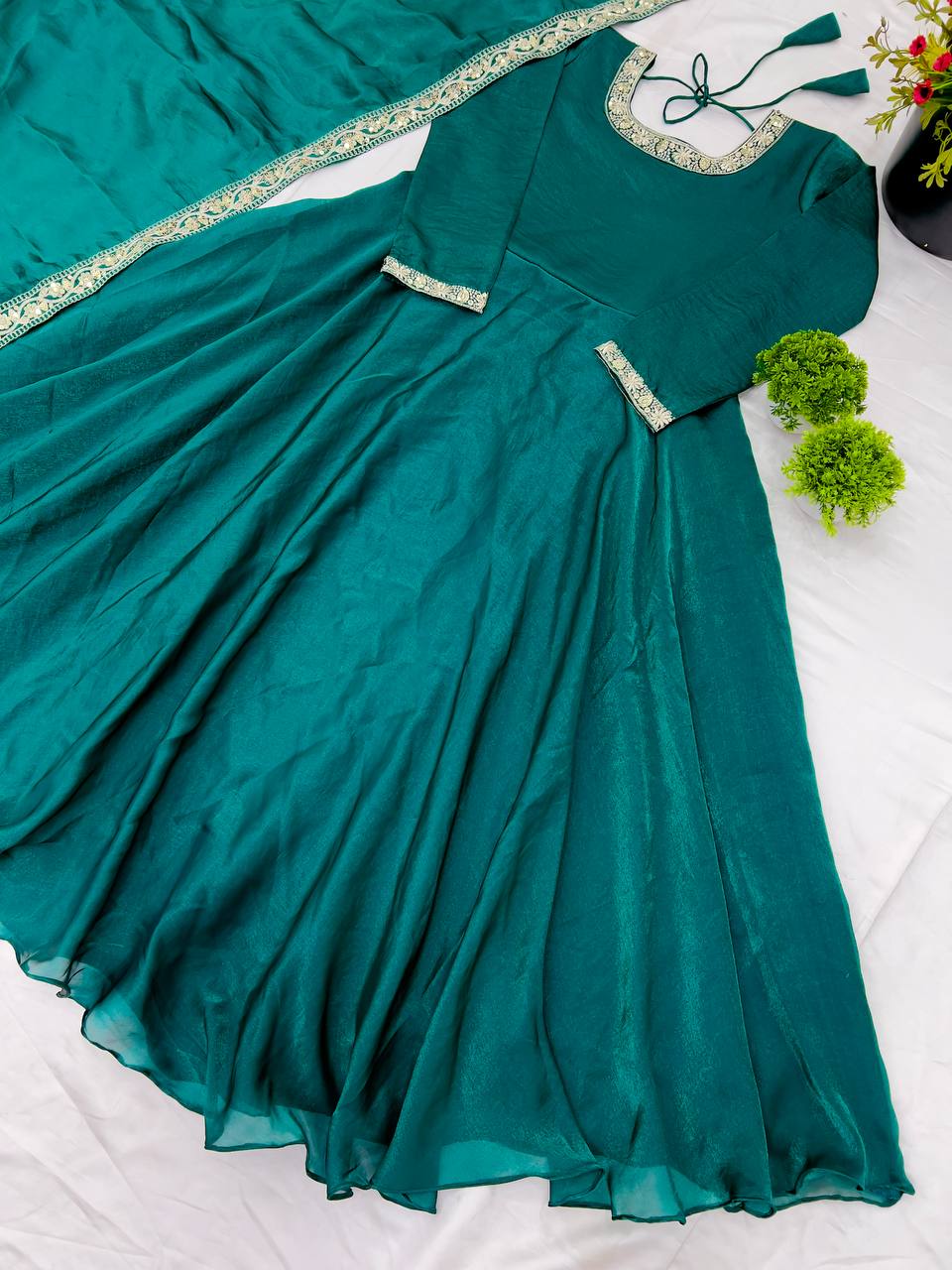 Wedding Wear Teal Heavy Fandy Silk With Embroidery Sequence Work Designer Gown