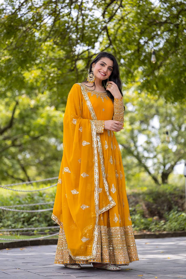 Function Wear Yellow Faux Georgette With Full Heavy Embroidery Sequence Work Gown