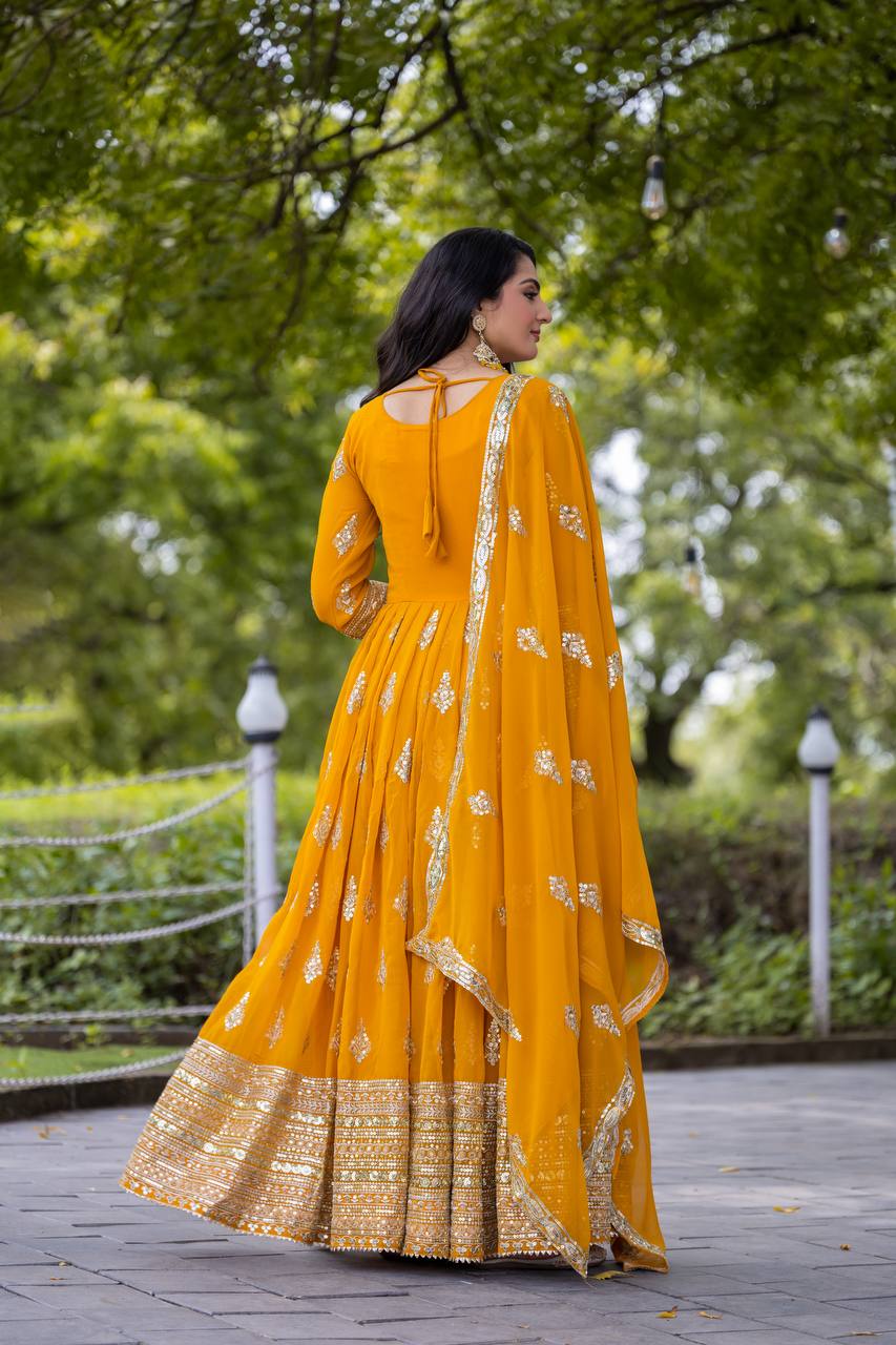 Function Wear Yellow Faux Georgette With Full Heavy Embroidery Sequence Work Gown