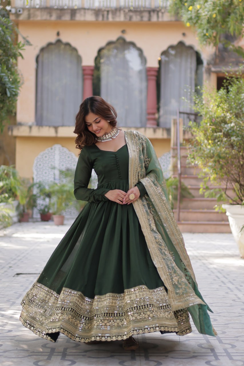 Mesmerizing Green Color Shimmer Vichitra With Rich Sequins Embroidered Work Designer Gown