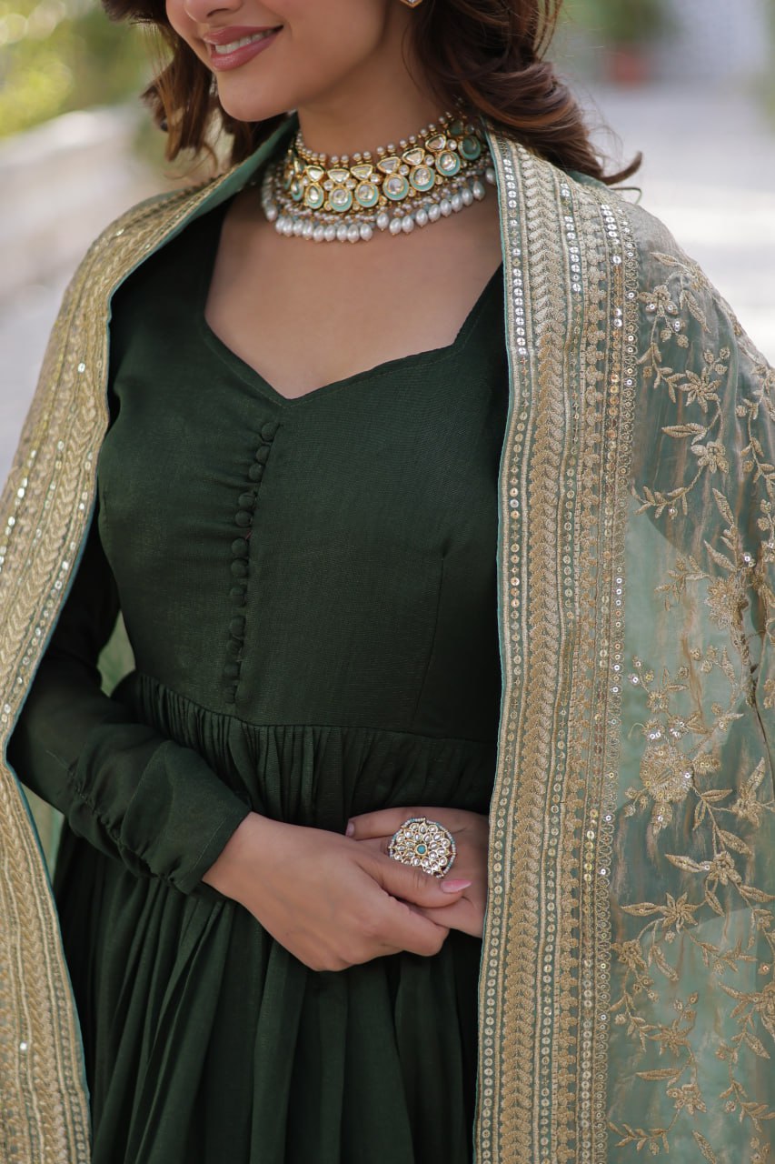 Mesmerizing Green Color Shimmer Vichitra With Rich Sequins Embroidered Work Designer Gown