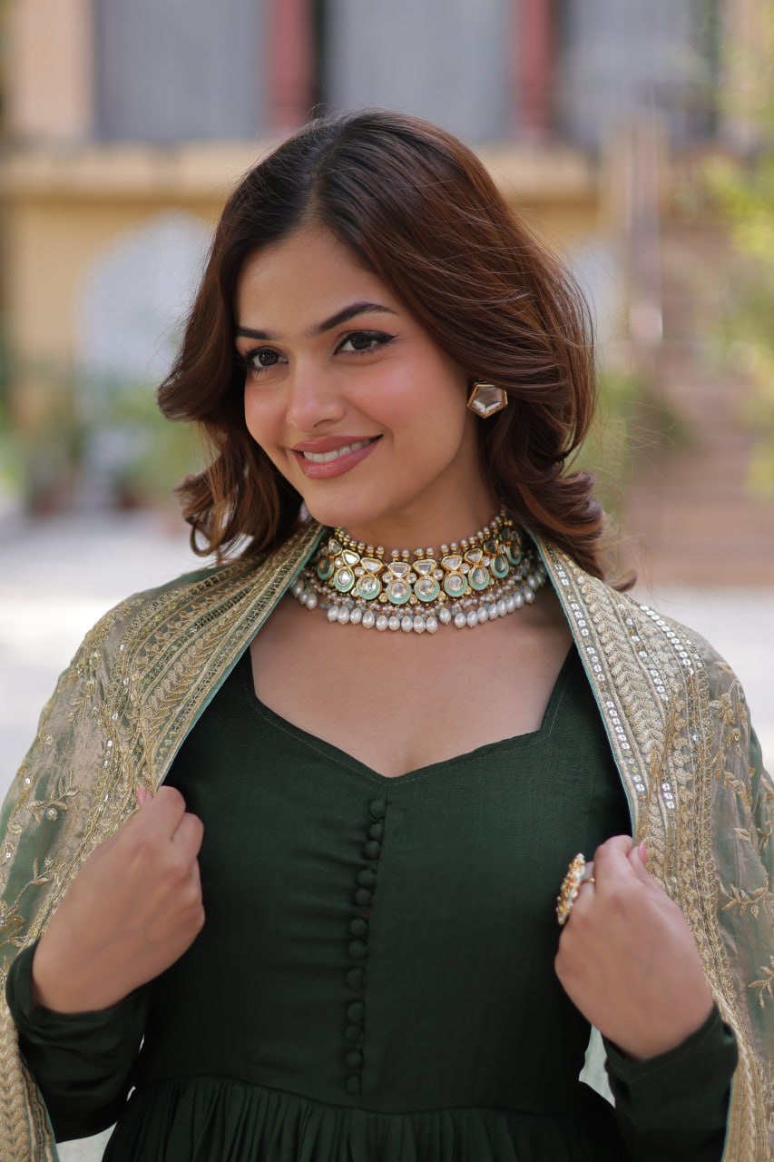 Mesmerizing Green Color Shimmer Vichitra With Rich Sequins Embroidered Work Designer Gown
