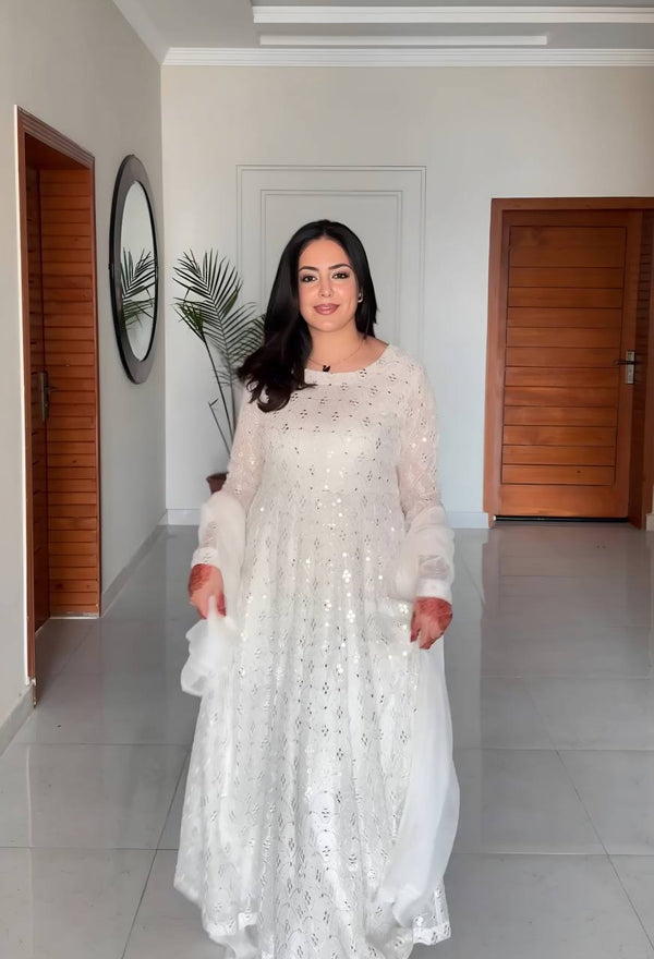 Dazzling White Color Faux Blooming With Heavy Sequins And Thread Embroidered Work Palazzo Suit
