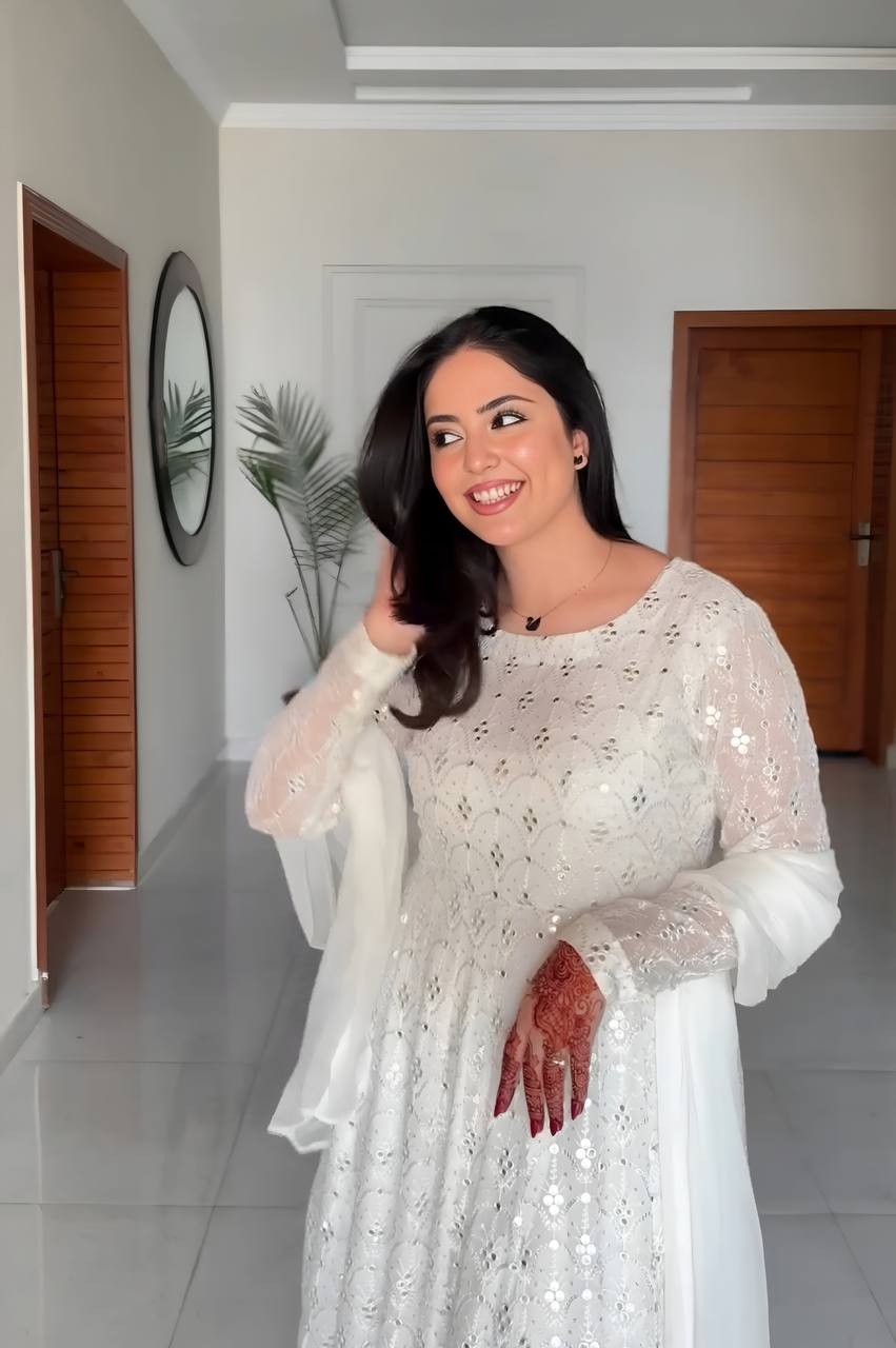 Dazzling White Color Faux Blooming With Heavy Sequins And Thread Embroidered Work Palazzo Suit
