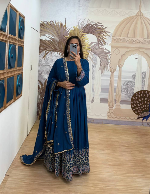 Festive Wear Teal Blue Color Embroidery Work On Daman Patta Gown With Flair