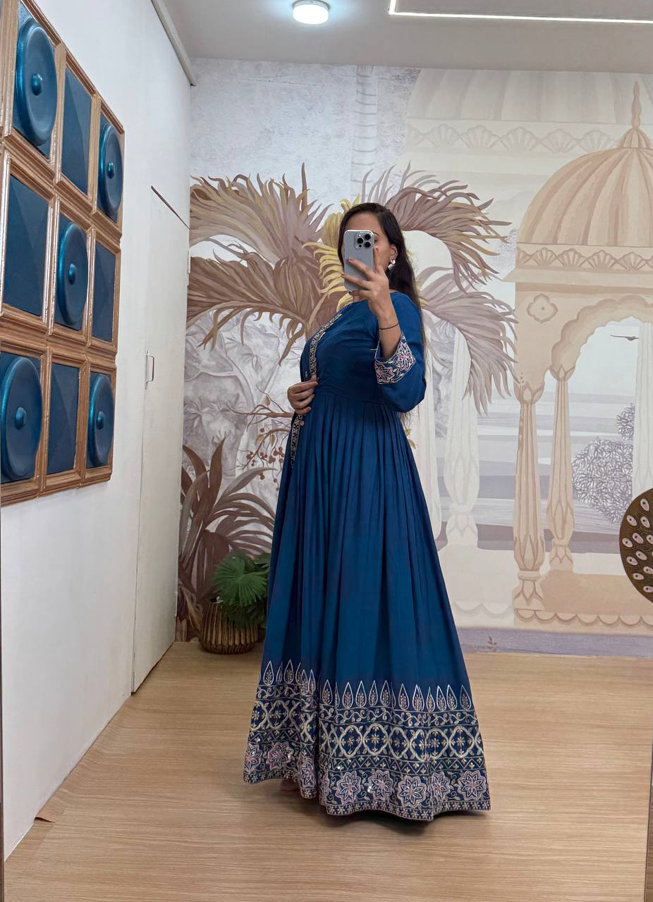 Festive Wear Teal Blue Color Embroidery Work On Daman Patta Gown With Flair