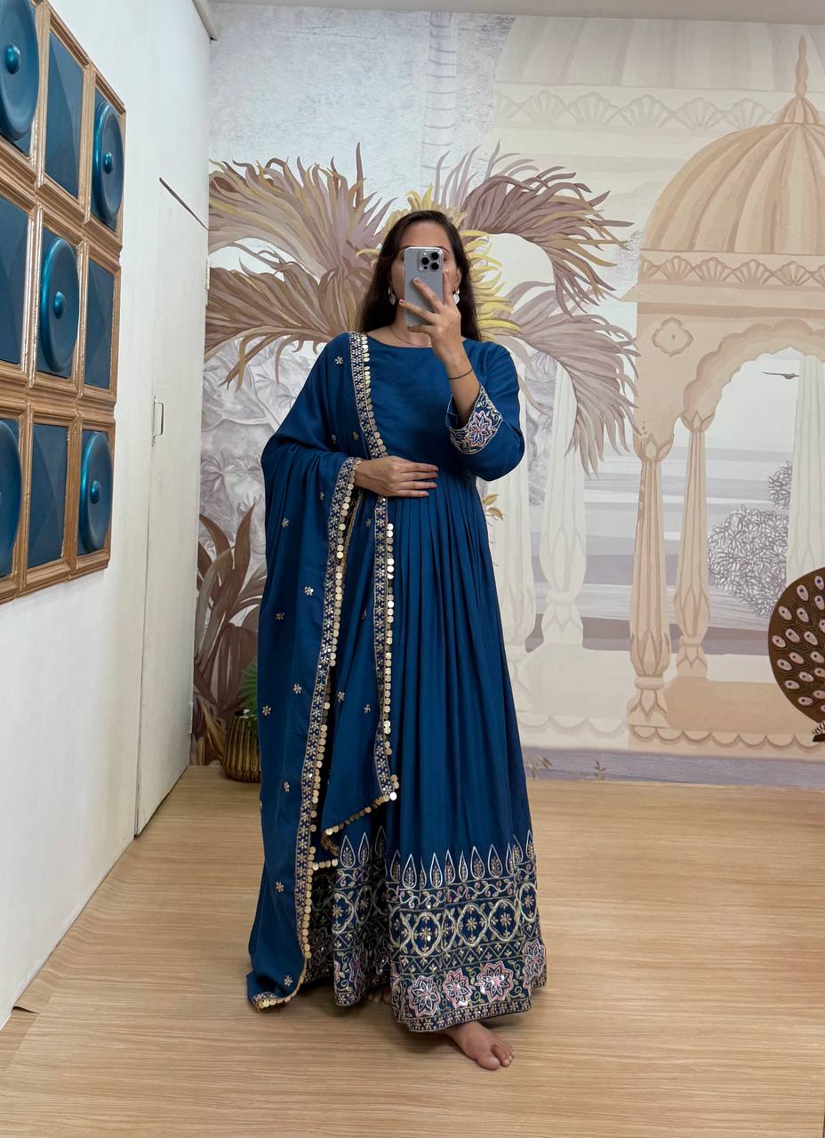 Festive Wear Teal Blue Color Embroidery Work On Daman Patta Gown With Flair