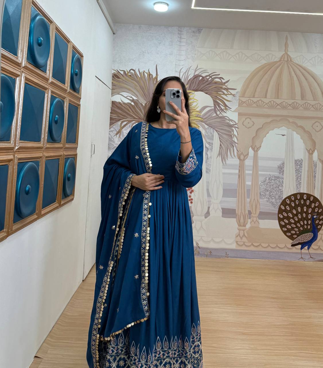 Festive Wear Teal Blue Color Embroidery Work On Daman Patta Gown With Flair