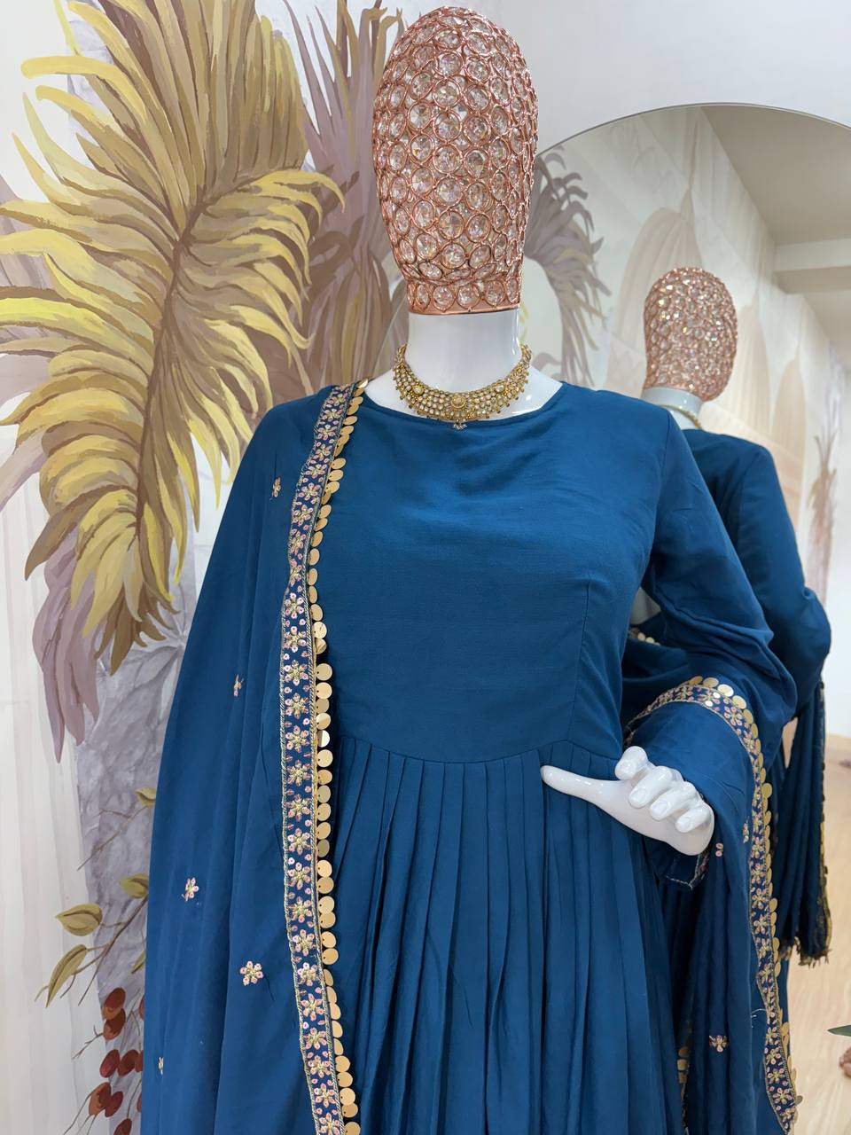 Festive Wear Teal Blue Color Embroidery Work On Daman Patta Gown With Flair
