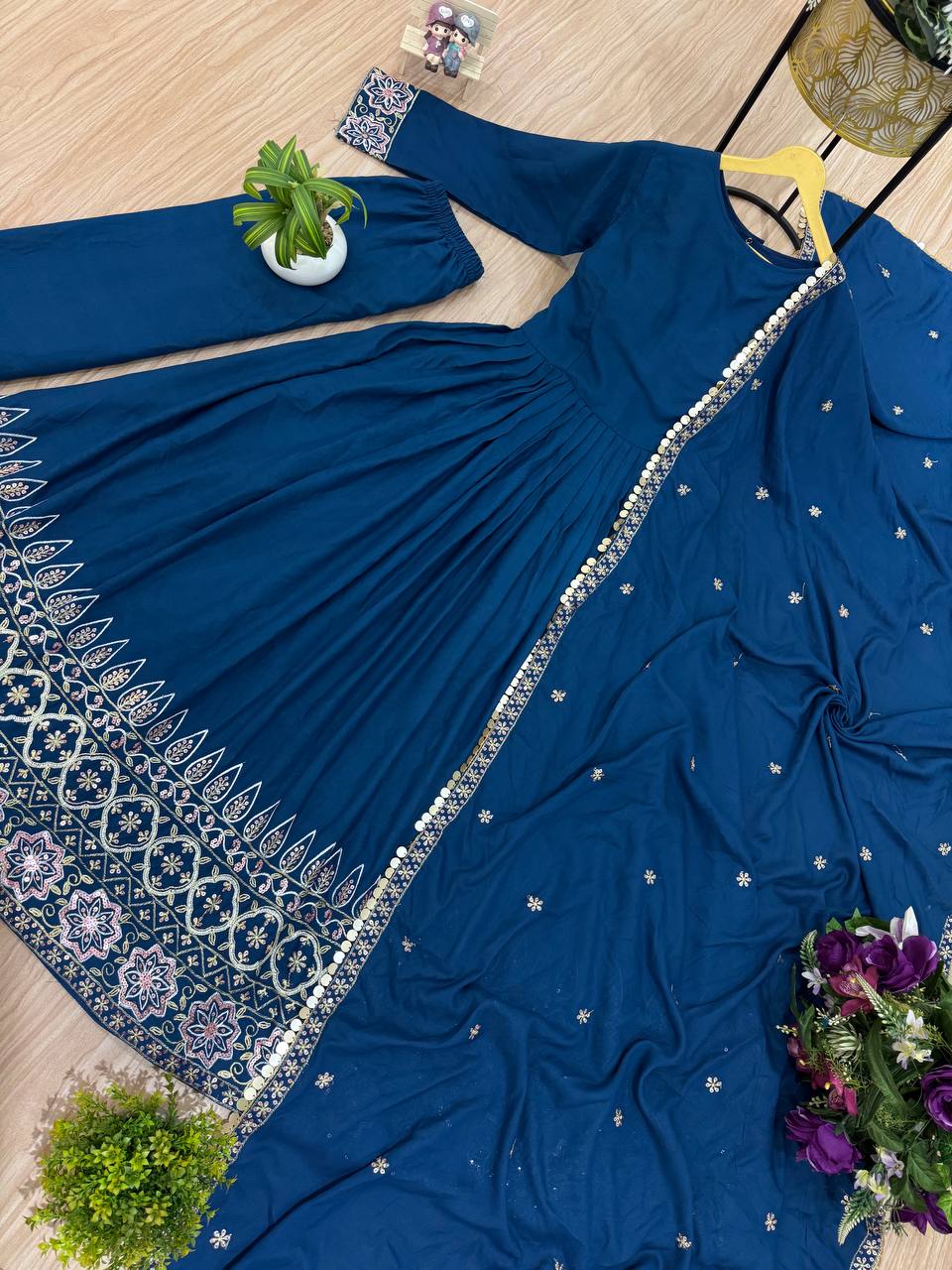 Festive Wear Teal Blue Color Embroidery Work On Daman Patta Gown With Flair