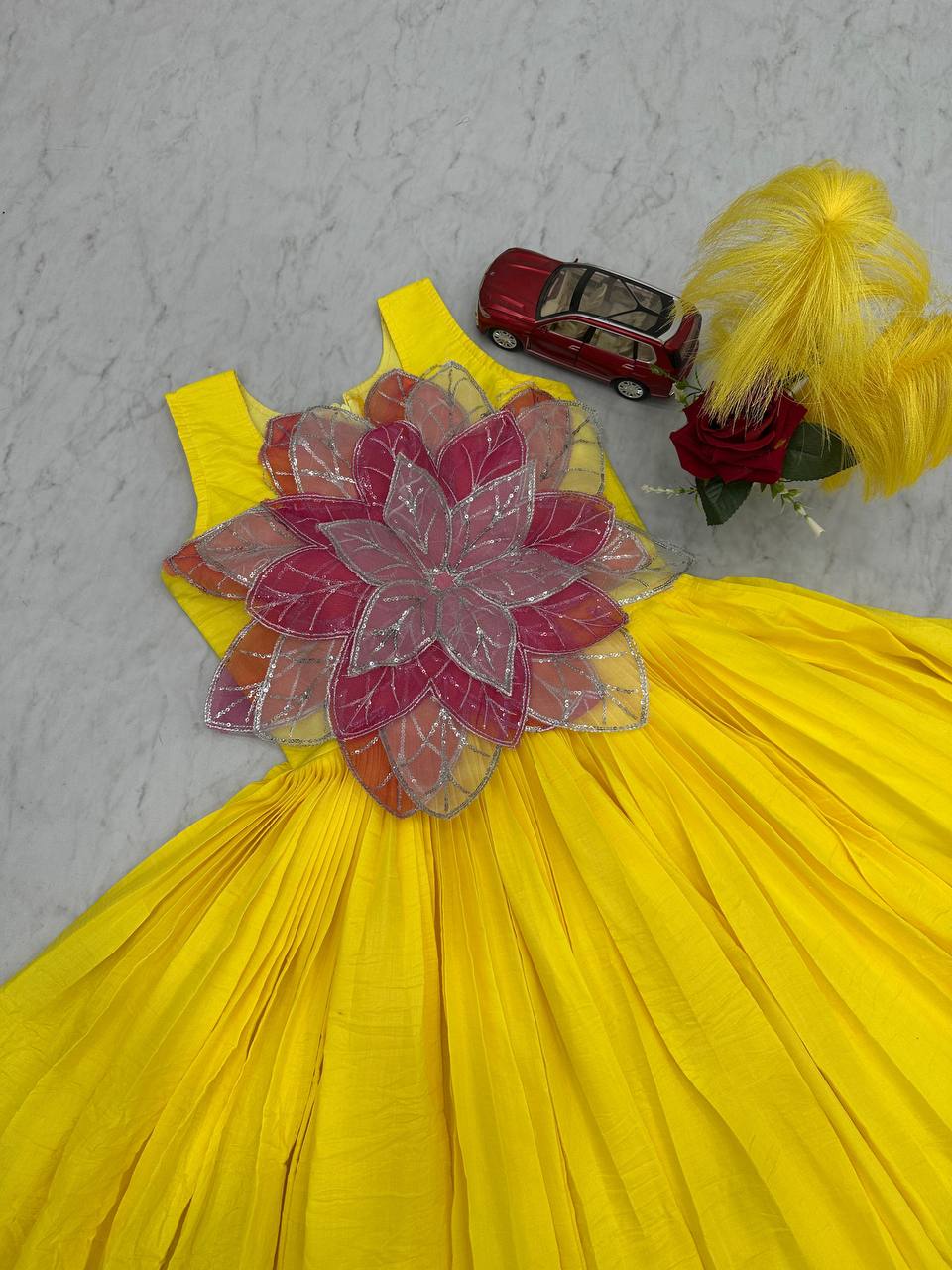 Beautiful Yellow Color Parampara Silk And Fancy Flowers Cutting Pasting Work Gown