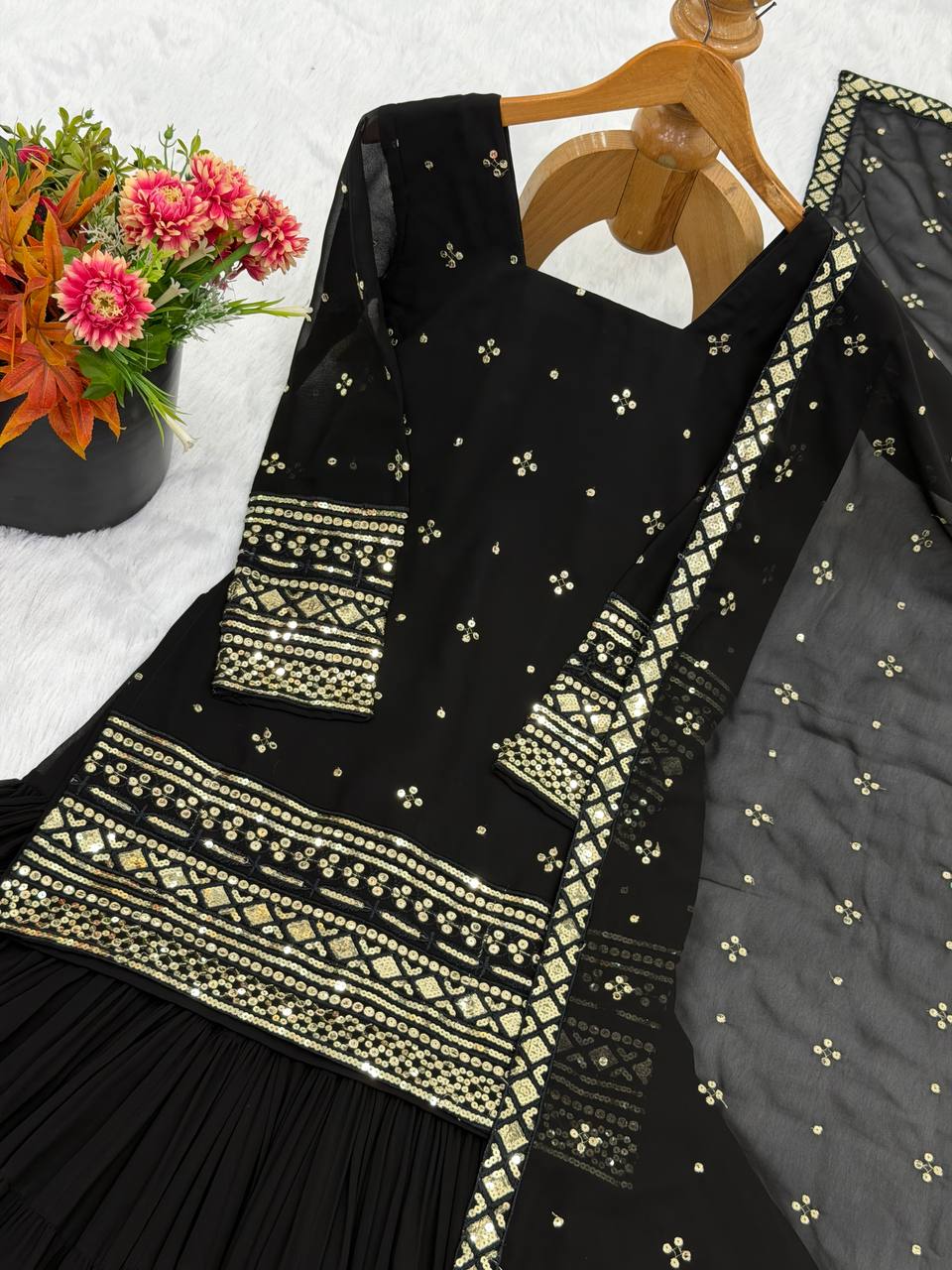 Arti Chauhan Black Color Georgette Top With Ruffle Sharara And Dupatta ...