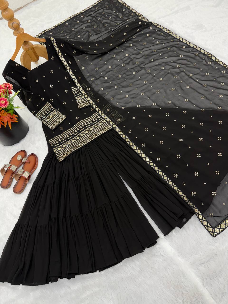 Arti Chauhan Black Color Georgette Top With Ruffle Sharara And Dupatta ...