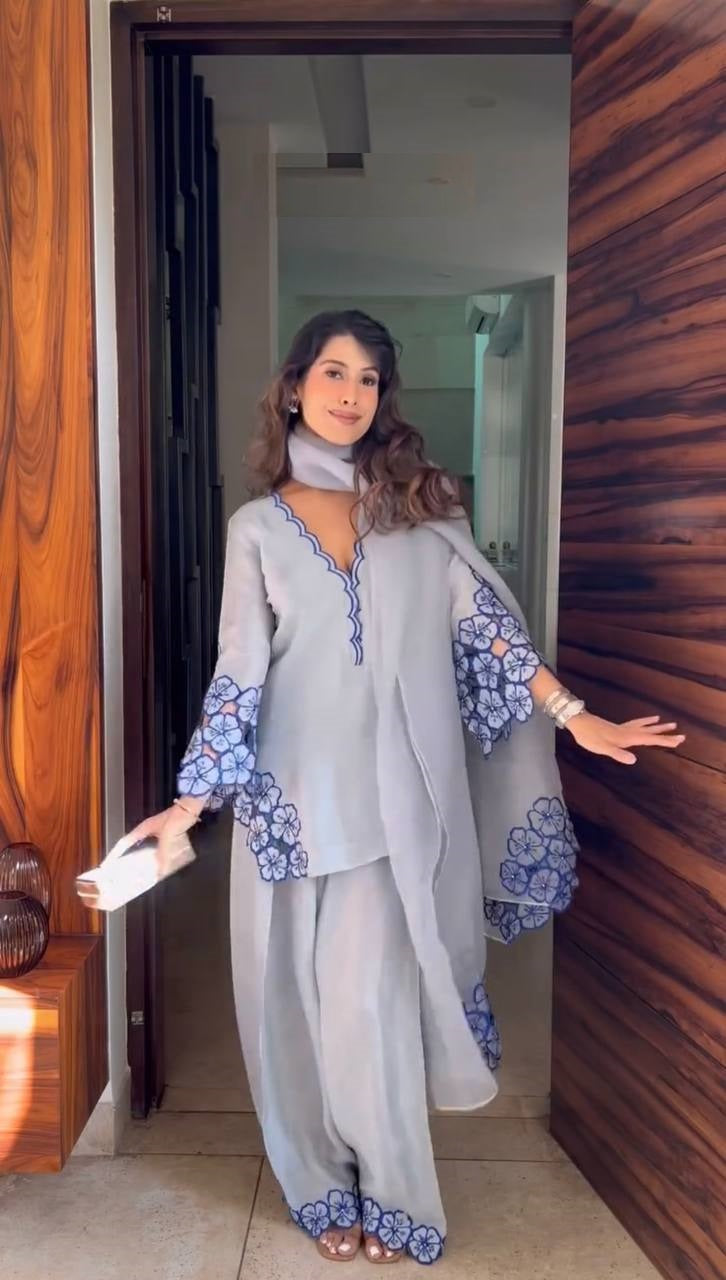 Party Wear Off White Color Pure Natural Crepe With Embroidery Work Palazzo Suit