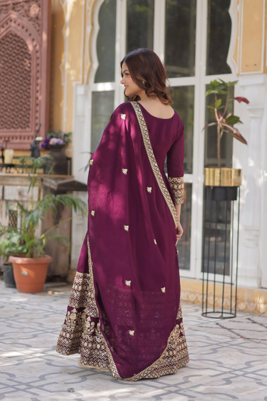 Stunning Wine Color Shimmer Vichitra With Rich Sequins Embroidered Work Designer Gown