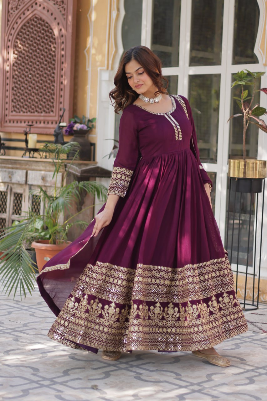 Stunning Wine Color Shimmer Vichitra With Rich Sequins Embroidered Work Designer Gown
