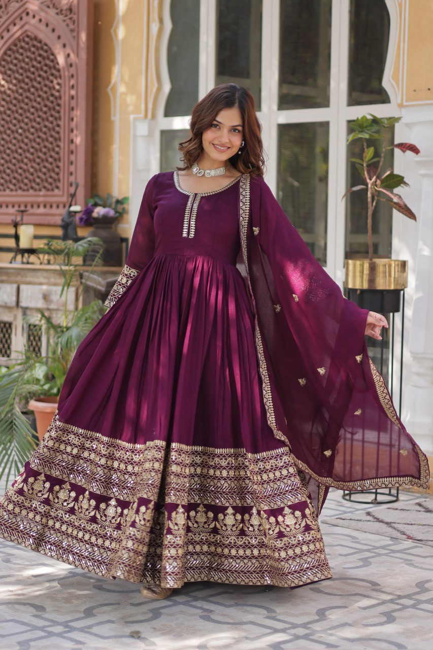 Stunning Wine Color Shimmer Vichitra With Rich Sequins Embroidered Work Designer Gown