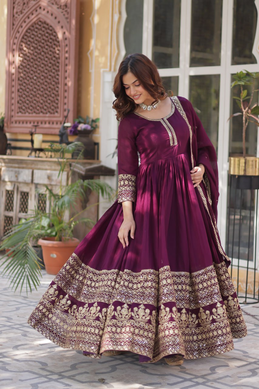 Stunning Wine Color Shimmer Vichitra With Rich Sequins Embroidered Work Designer Gown