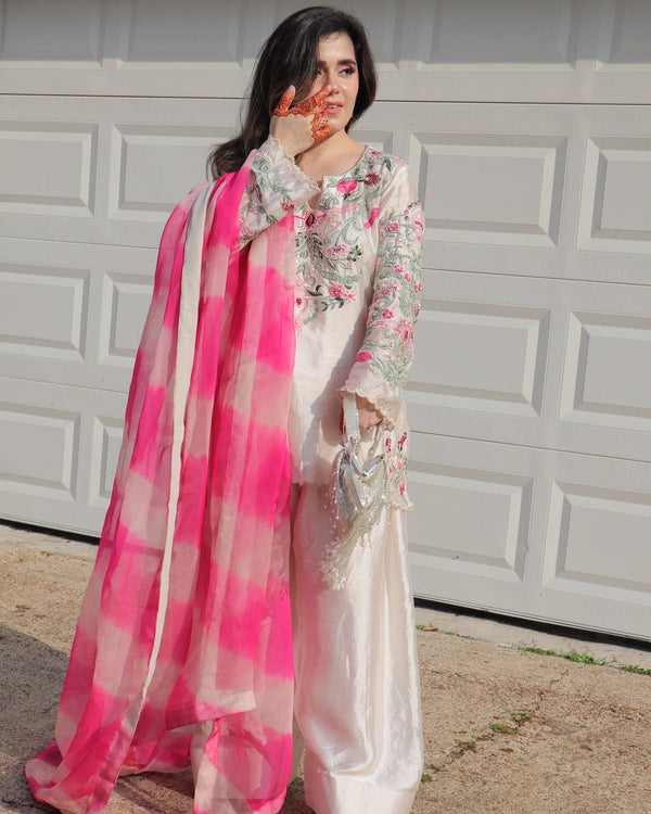 Occasion Wear White Color Natural Crep Silk With Embrodary Siquance Work Palazzo Suit