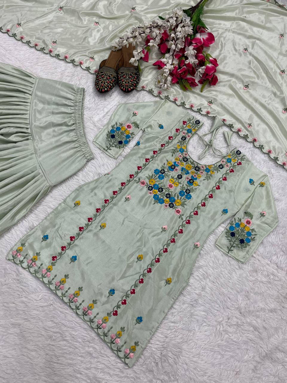 Attractive Pista Color Beautiful Embroidered Patiyala Salwar Suit