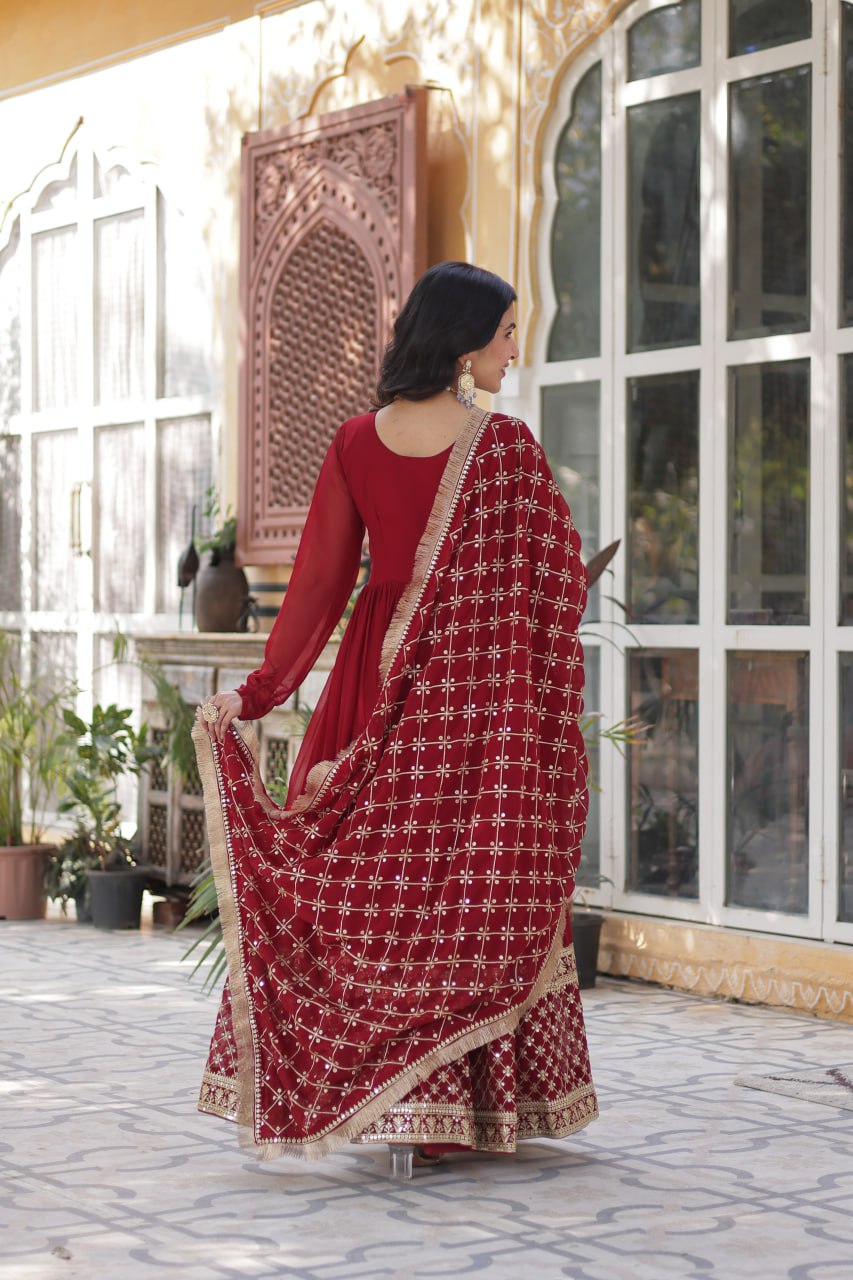 Reception Wear Maroon Color Faux Blooming With Embroidery Zari Sequins Work Designer Gown