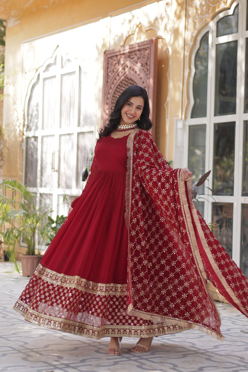 Reception Wear Maroon Color Faux Blooming With Embroidery Zari Sequins Work Designer Gown