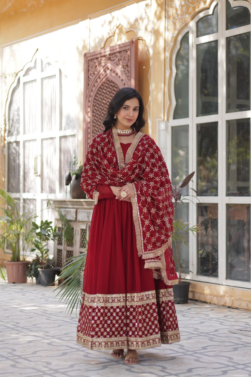 Reception Wear Maroon Color Faux Blooming With Embroidery Zari Sequins Work Designer Gown