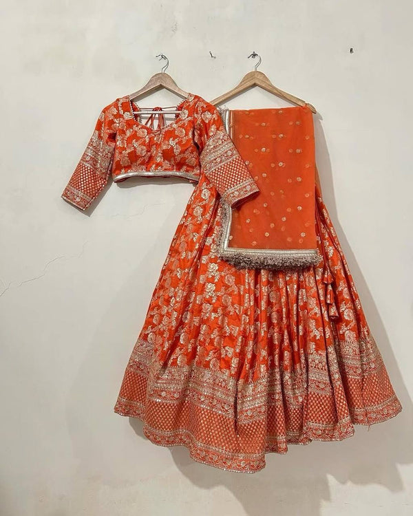 Ceremony Wear Orange Color Premium Jacquard Beautiful Thread Embroidery With Sequins Work Lehenga Choli