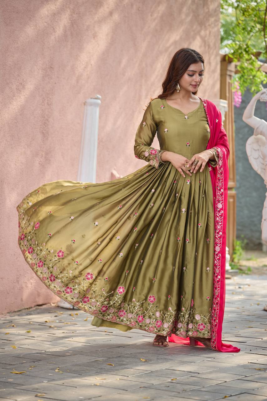 Occasion Wear Green Color Pure Rangoli Silk With Heavy Embroidery Sequence Work Beautiful Gown