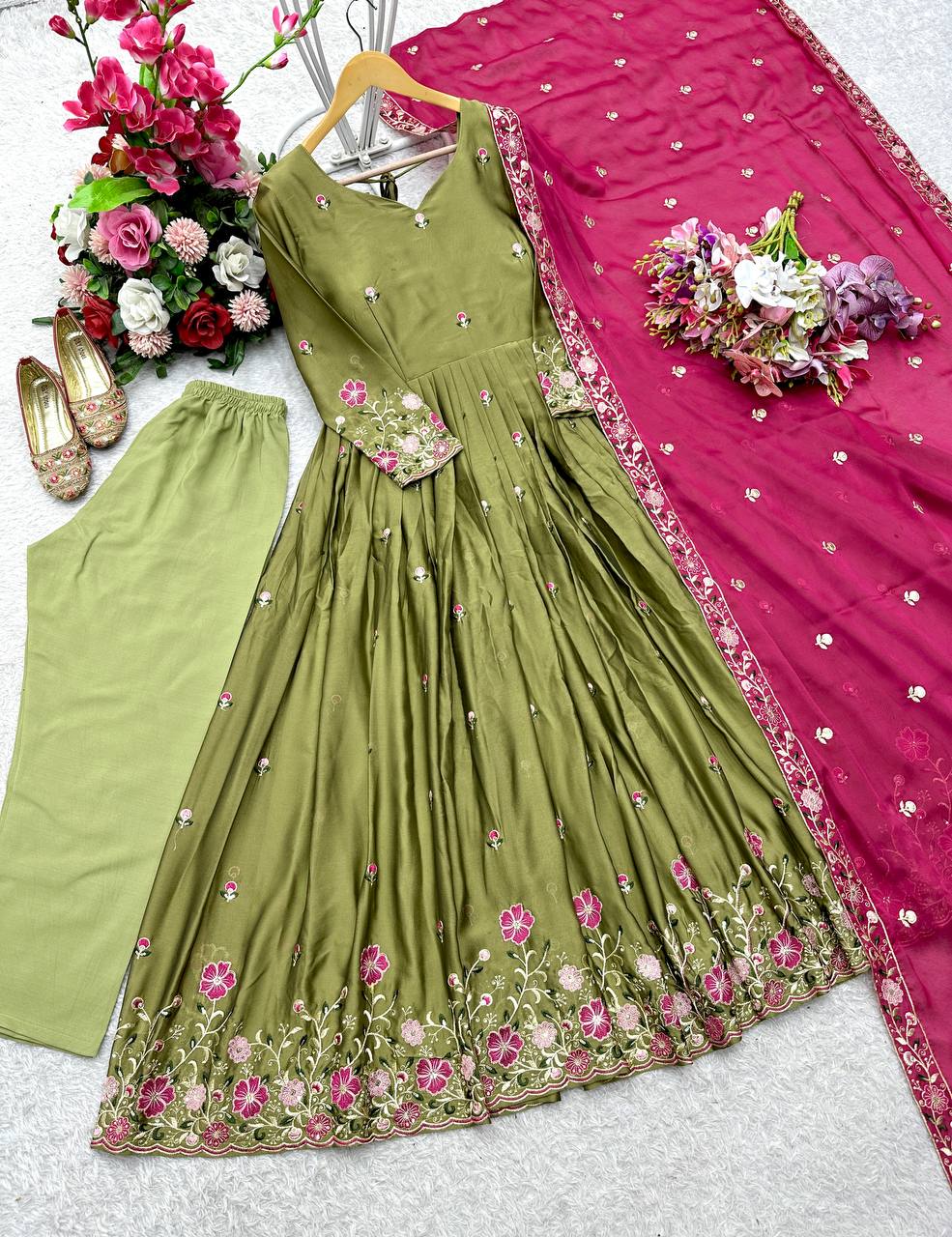 Occasion Wear Green Color Pure Rangoli Silk With Heavy Embroidery Sequence Work Beautiful Gown