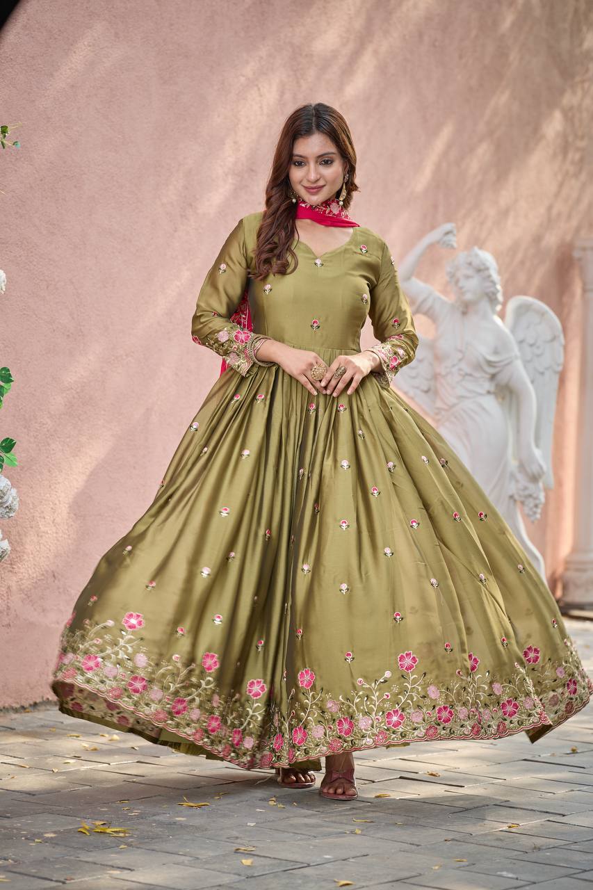 Occasion Wear Green Color Pure Rangoli Silk With Heavy Embroidery Sequence Work Beautiful Gown