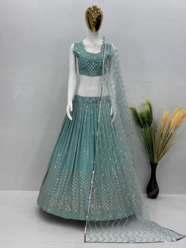 Elegant Aqua Blue Color Faux Georgette Embroidered Sequence Work With Real Mirror Hand Work Lehenga Choli