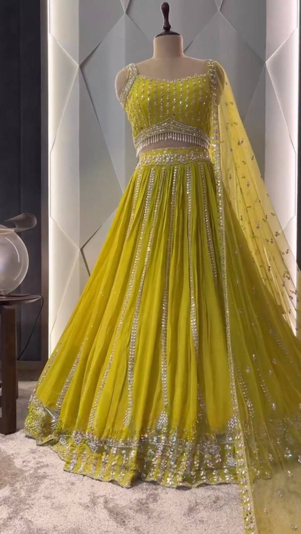 Bridal Wear Lemon Color Faux Georgette Heavy Embroidered Sequence Work With Real Mirror Hand Work Lehenga Choli