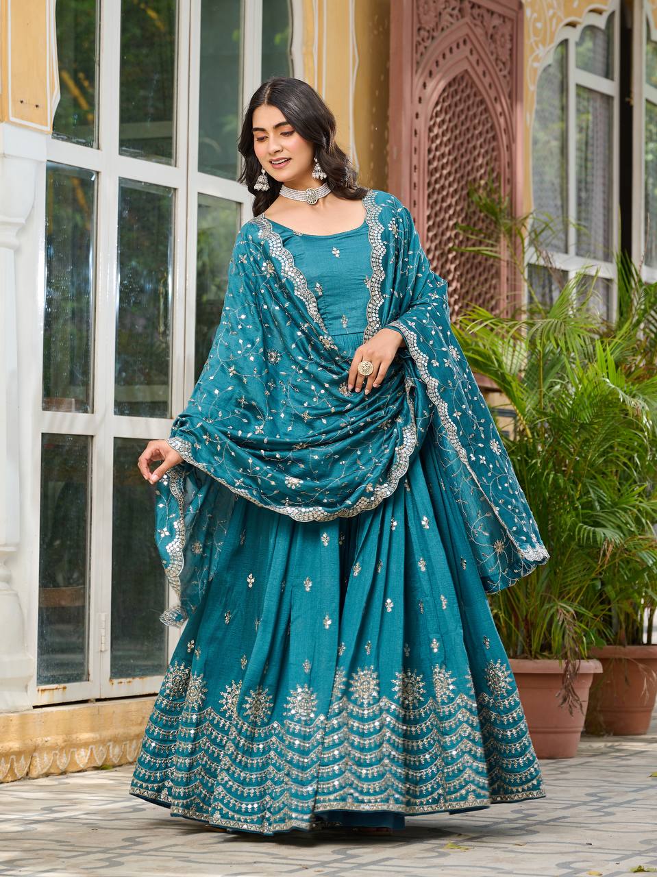 Ceremony Wear Teal Green Color Pure Vichitra Silk And Sequence Embroidery Work Gown