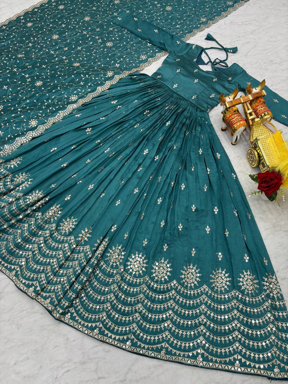 Ceremony Wear Teal Green Color Pure Vichitra Silk And Sequence Embroidery Work Gown