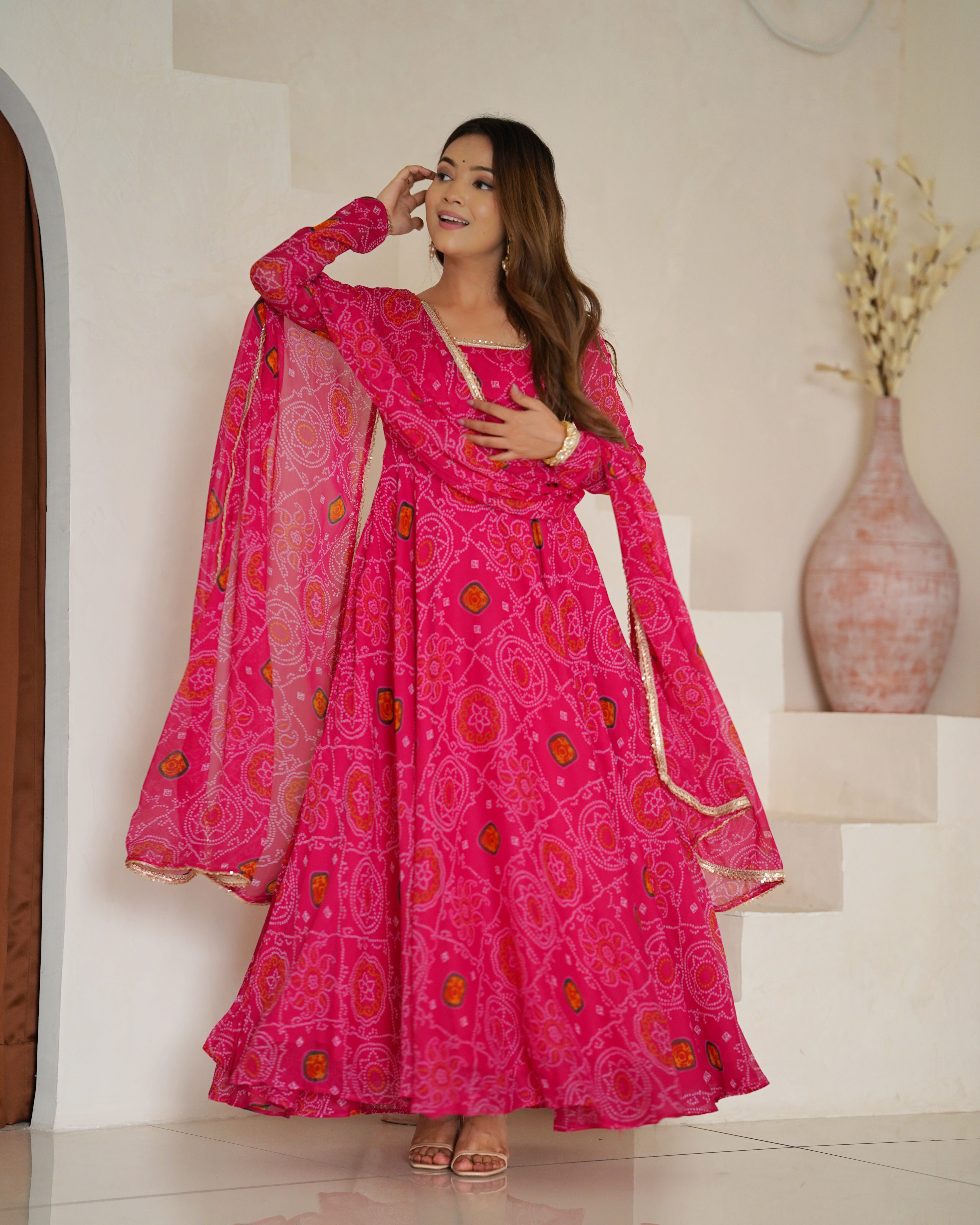 Festive Wear Rani Pink Color Pure Soft Lightweight Chiffon Bandhej Fabric Designer Gown