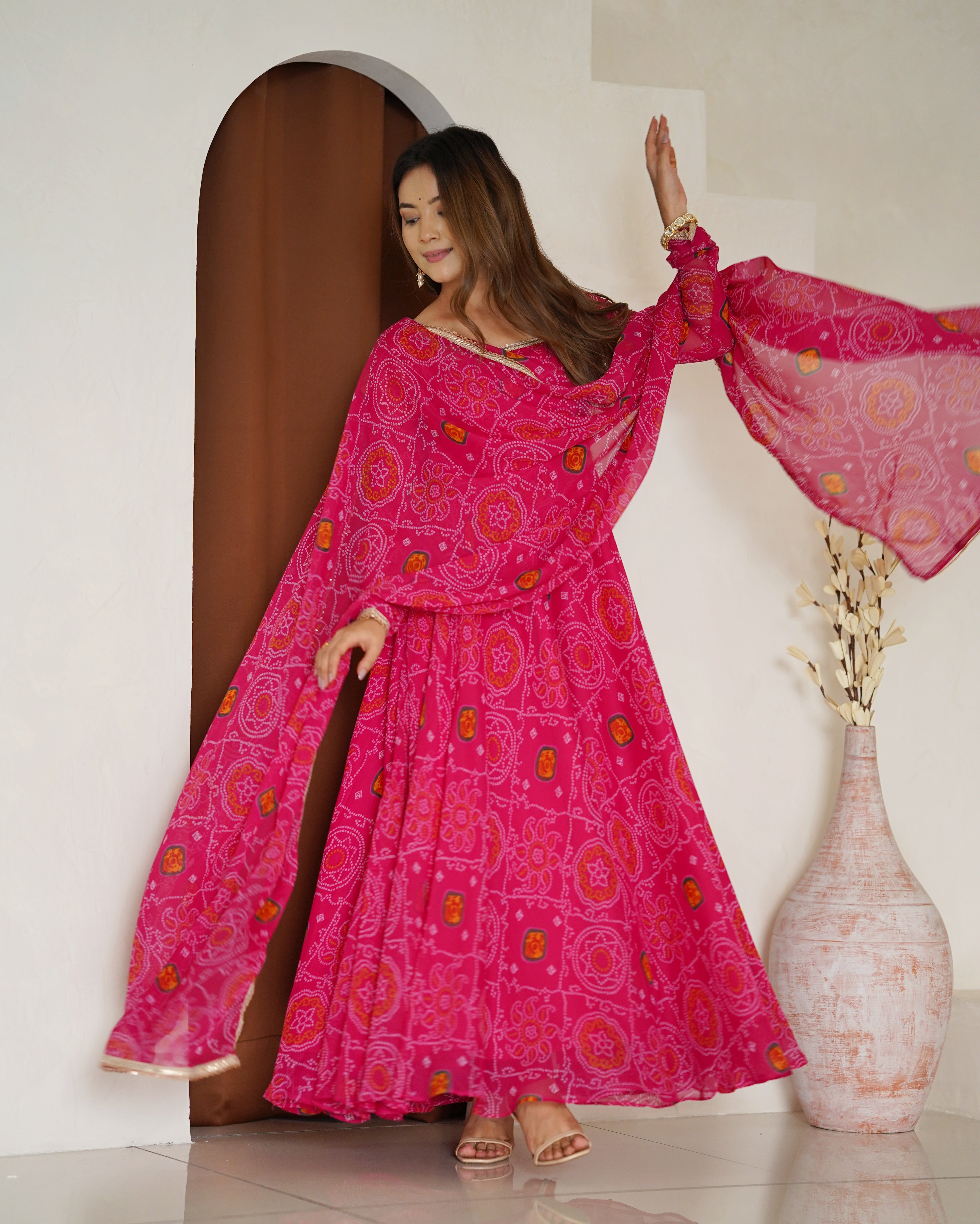 Festive Wear Rani Pink Color Pure Soft Lightweight Chiffon Bandhej Fabric Designer Gown