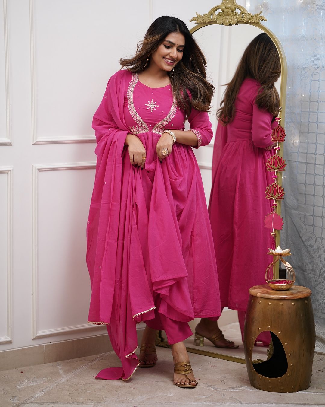 Charming Pink Color Muslin Cotton And Embroidered Work With Flared Kurta Set