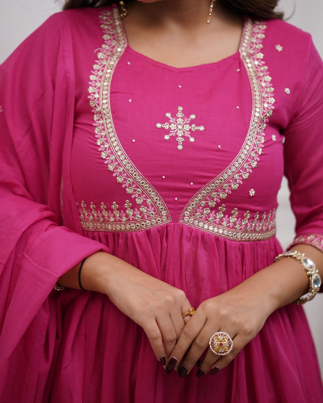 Charming Pink Color Muslin Cotton And Embroidered Work With Flared Kurta Set