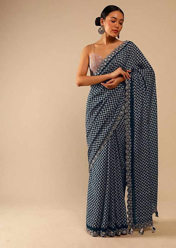 Eyes Catching Print With Border Teal Blue Color Saree